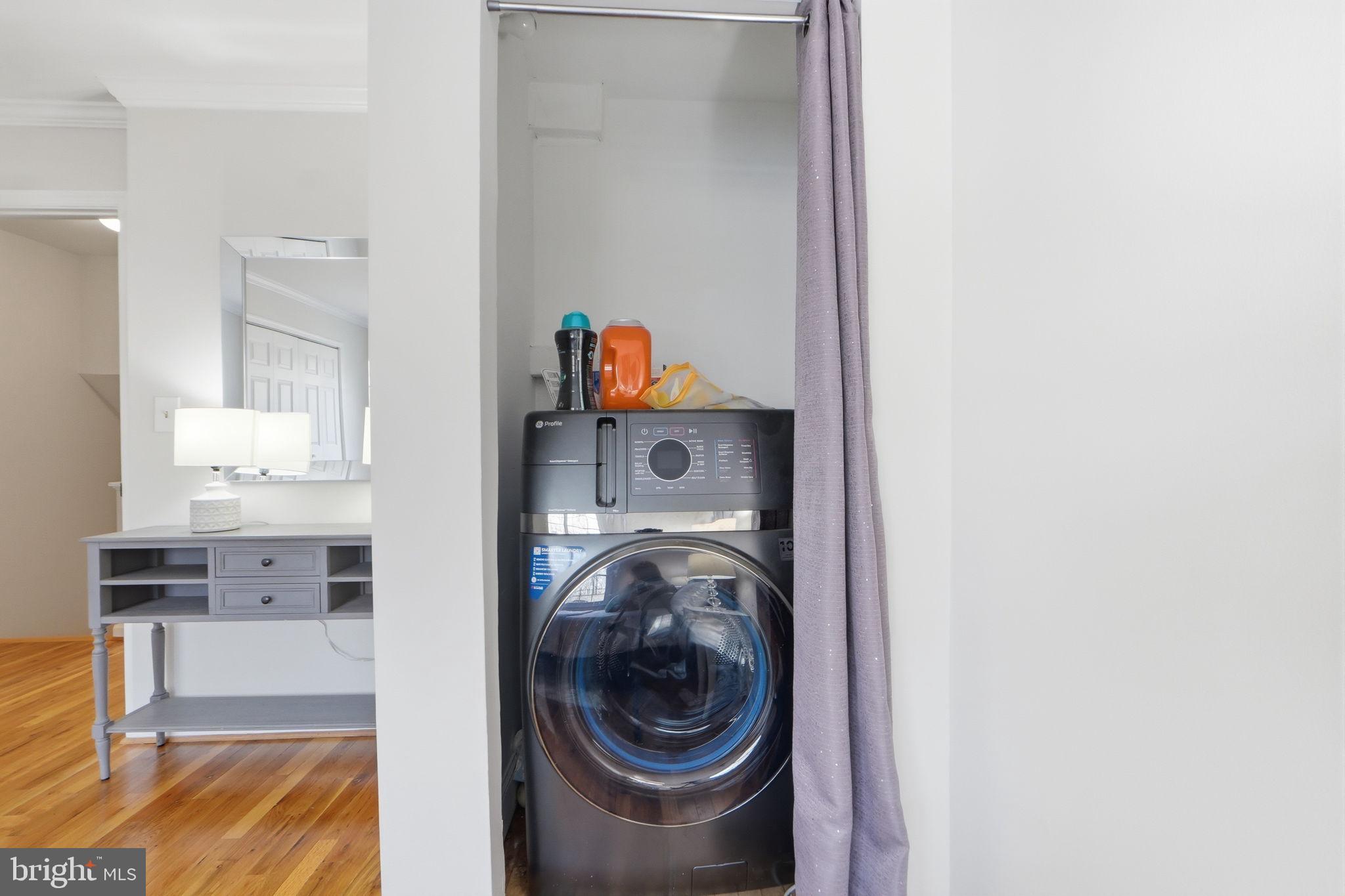 8230 Carrleigh Parkway, Unit 84 Springfield, VA 22152 - Photo 16 of 28 a view of washer and dryer in a utility room