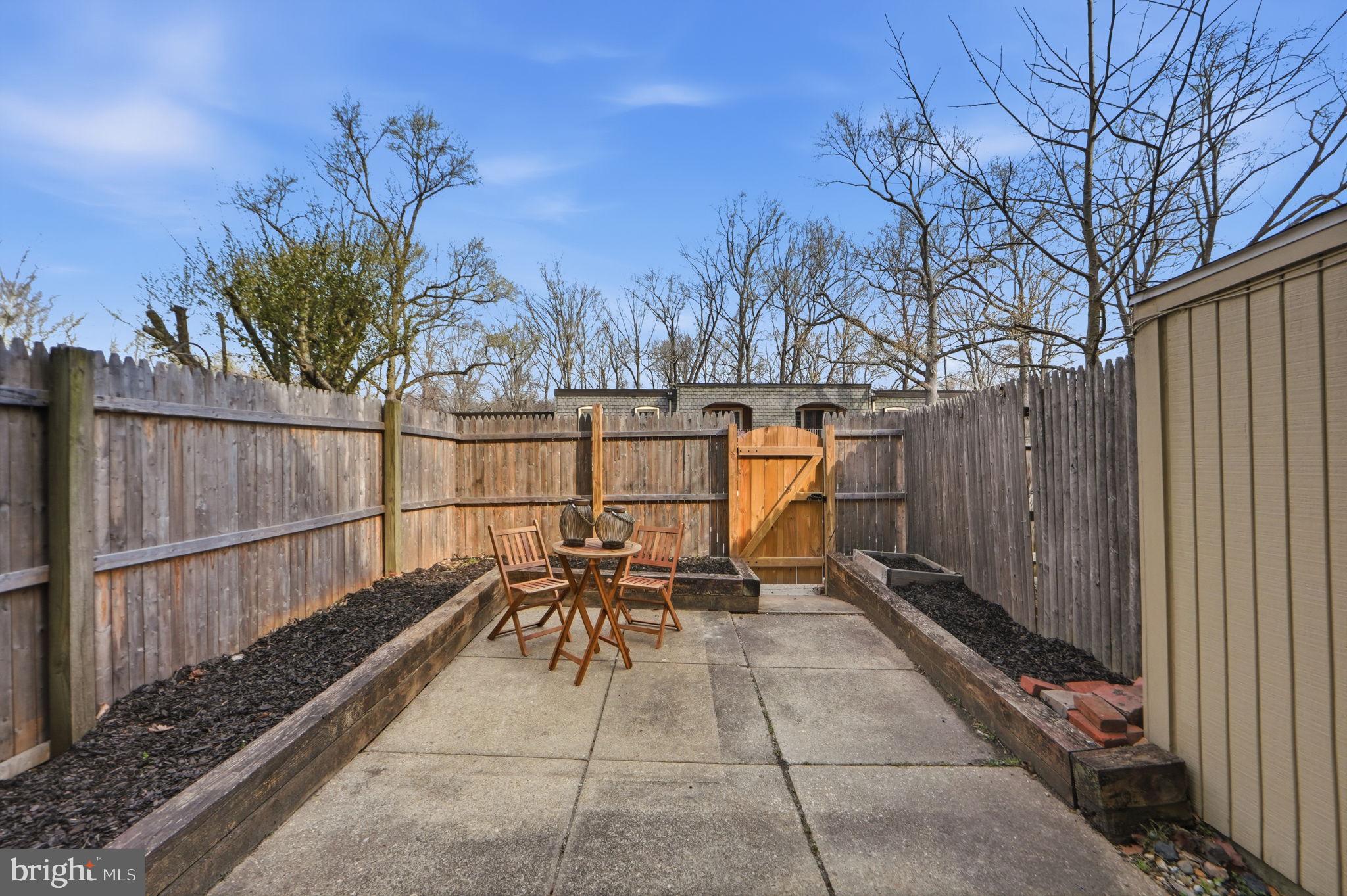 8230 Carrleigh Parkway, Unit 84 Springfield, VA 22152 - Photo 23 of 28 a view of outdoor space with seating area