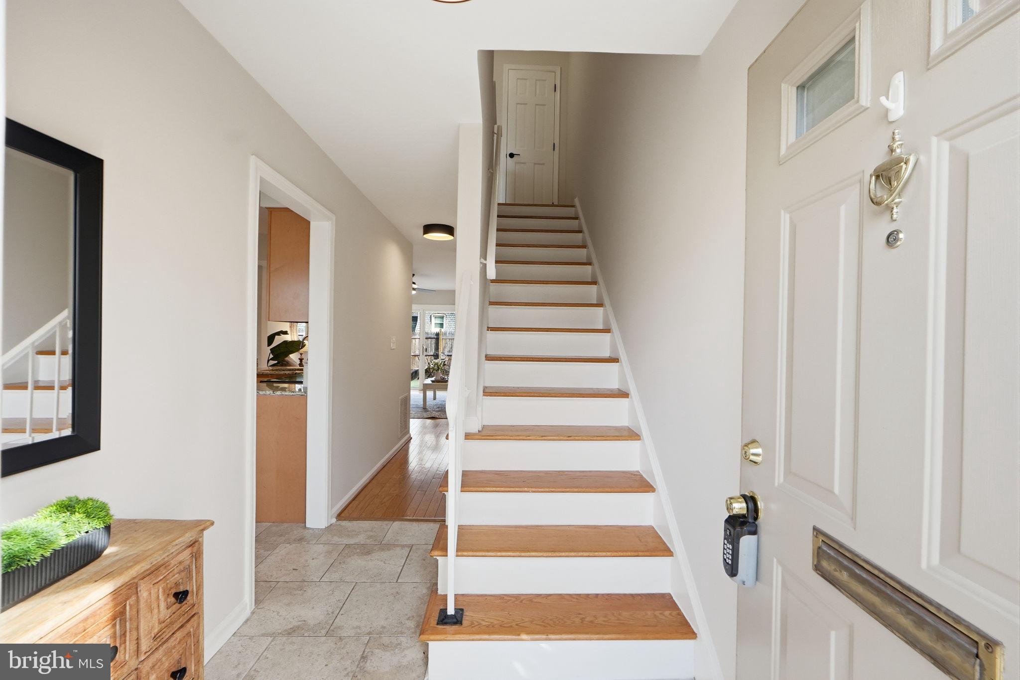 8230 Carrleigh Parkway, Unit 84 Springfield, VA 22152 - Photo 3 of 28 a view of a bedroom with wooden floor and entryway