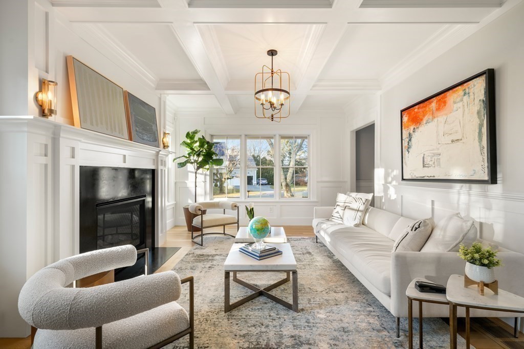 6 Juniper Place Lexington, MA 02420 - Photo 2 of 32 a living room with furniture a fireplace and a flat screen tv
