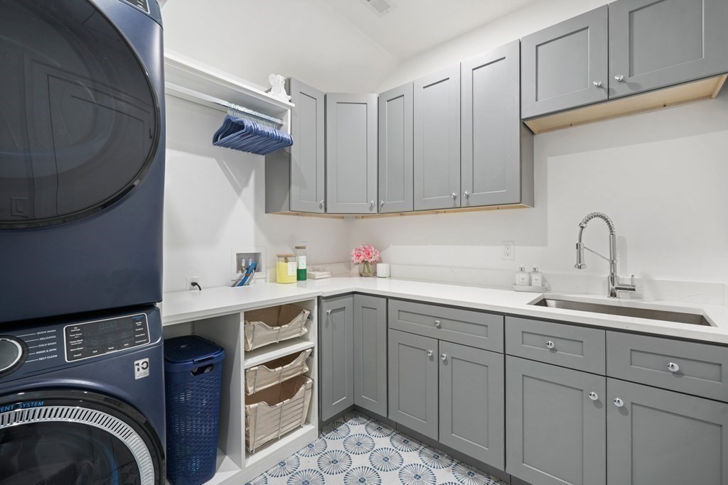 6 Juniper Place Lexington, MA 02420 - Photo 25 of 32 a kitchen with a sink a stove and cabinets