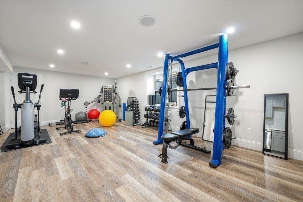 6 Juniper Place Lexington, MA 02420 - Photo 26 of 32 a view of a room with gym equipment