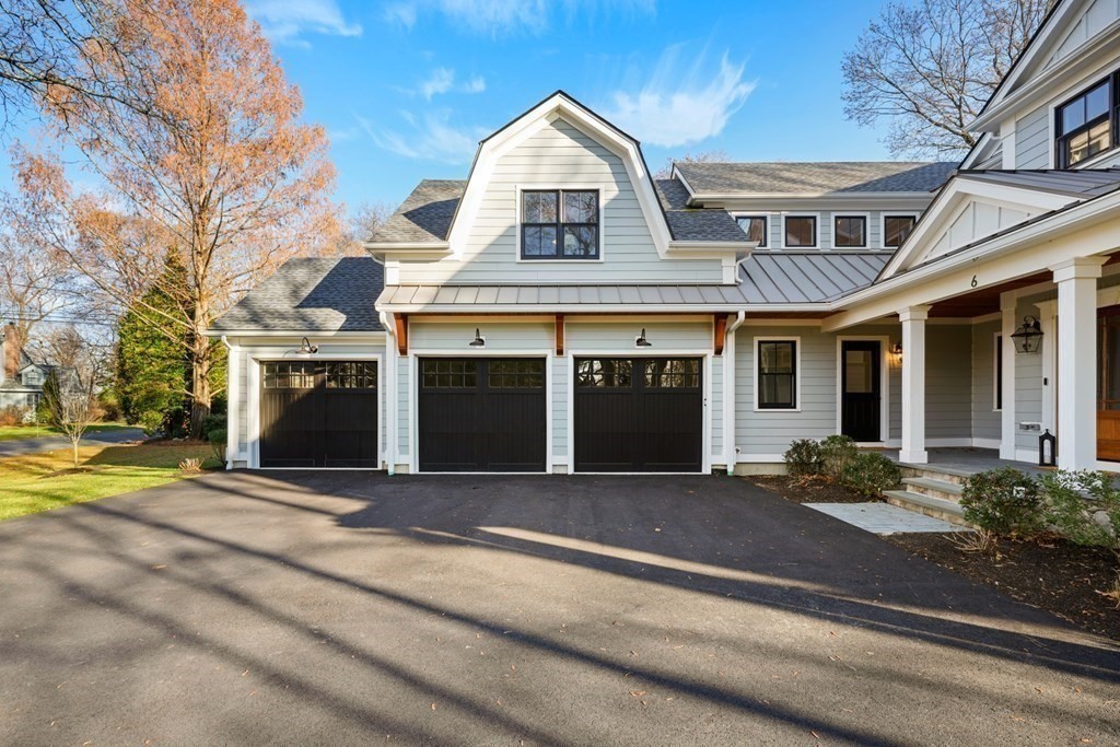 6 Juniper Place Lexington, MA 02420 - Photo 32 of 32 a front view of a house with a yard
