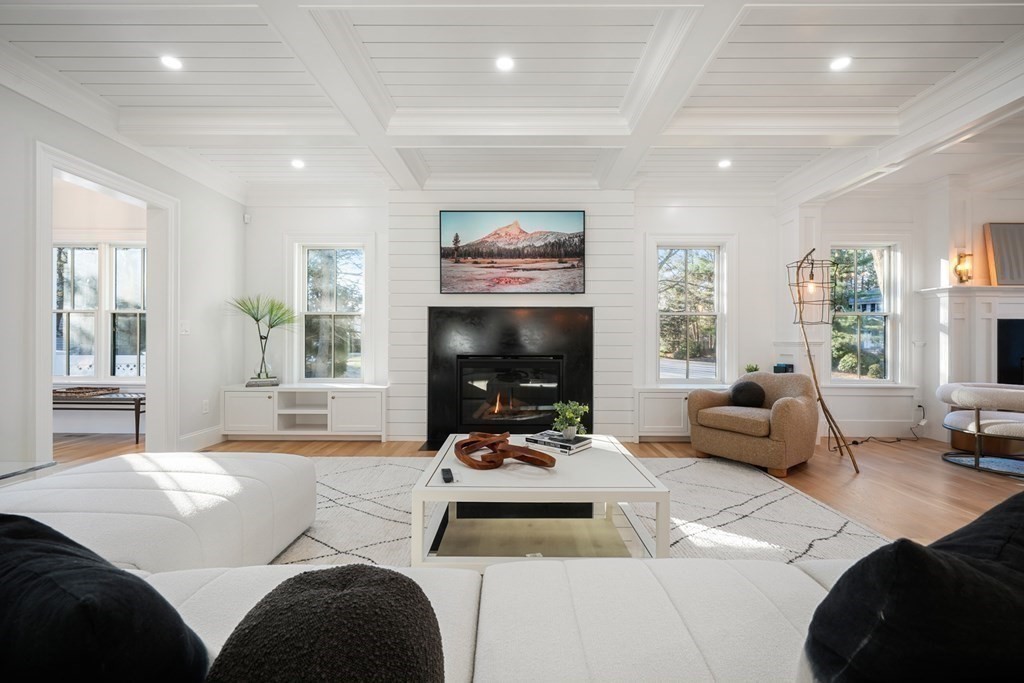 6 Juniper Place Lexington, MA 02420 - Photo 5 of 32 a living room with furniture large window and a fireplace