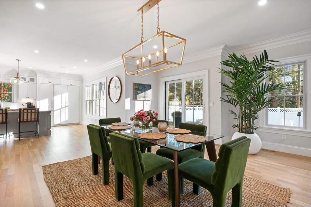 6 Juniper Place Lexington, MA 02420 - Photo 7 of 32 a view of a dining room with furniture window and wooden floor