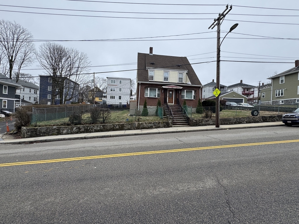 618 Harvard Street Boston, MA 02126 - Photo 2 of 42 a view of building with car parked
