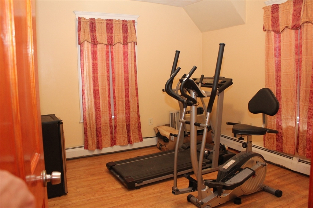 618 Harvard Street Boston, MA 02126 - Photo 35 of 42 a view of a room with gym equipment