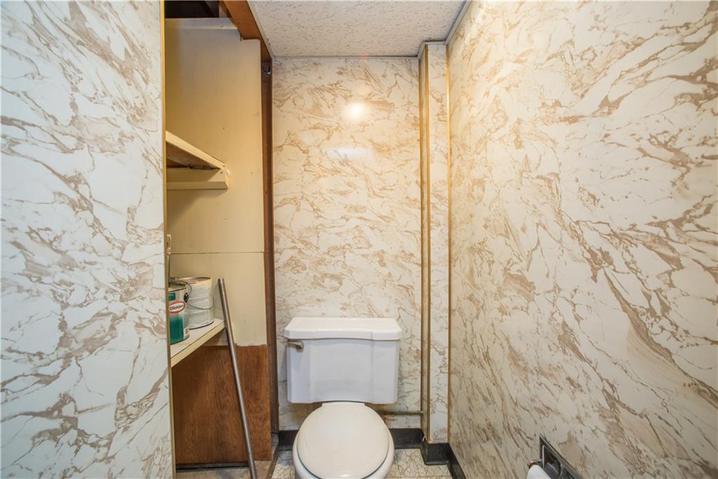 3097 McRoberts Road Pittsburgh, PA 15234 - Photo 22 of 25 Half bath completes the lower level.