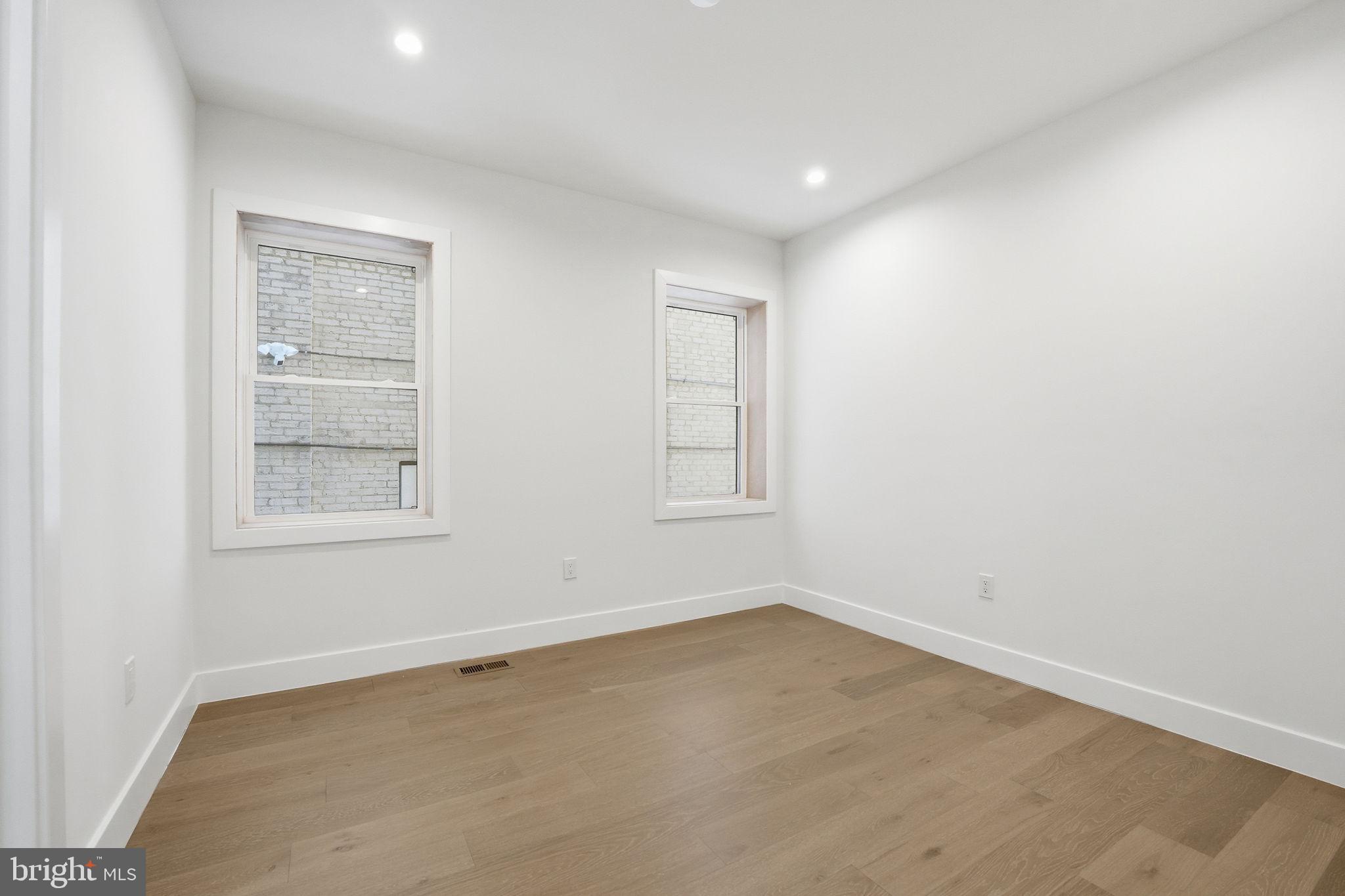 3916 8th Street Northwest, Unit B Washington, DC 20011 - Photo 15 of 24 an empty room with a window