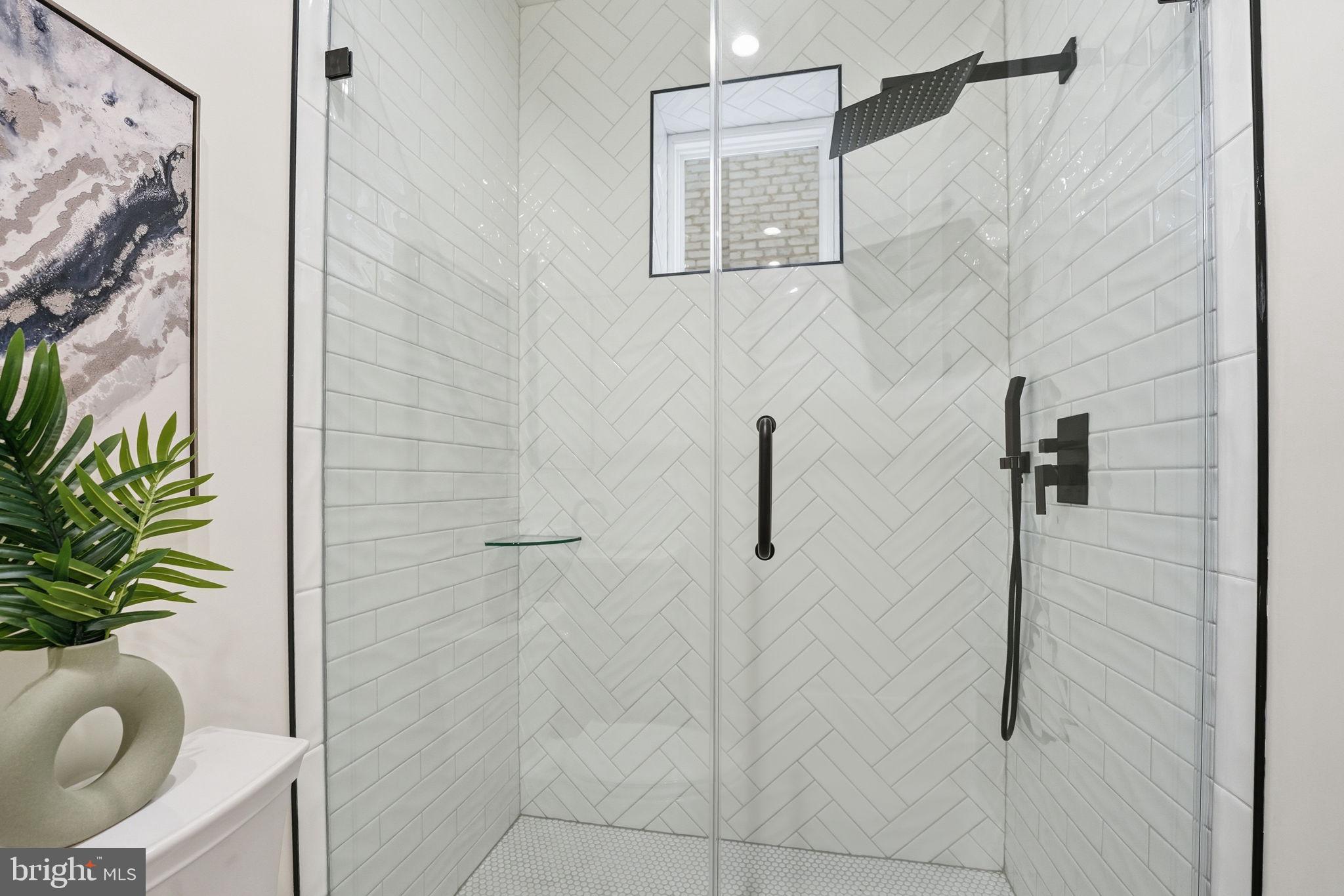3916 8th Street Northwest, Unit B Washington, DC 20011 - Photo 17 of 24 a bathroom with a shower