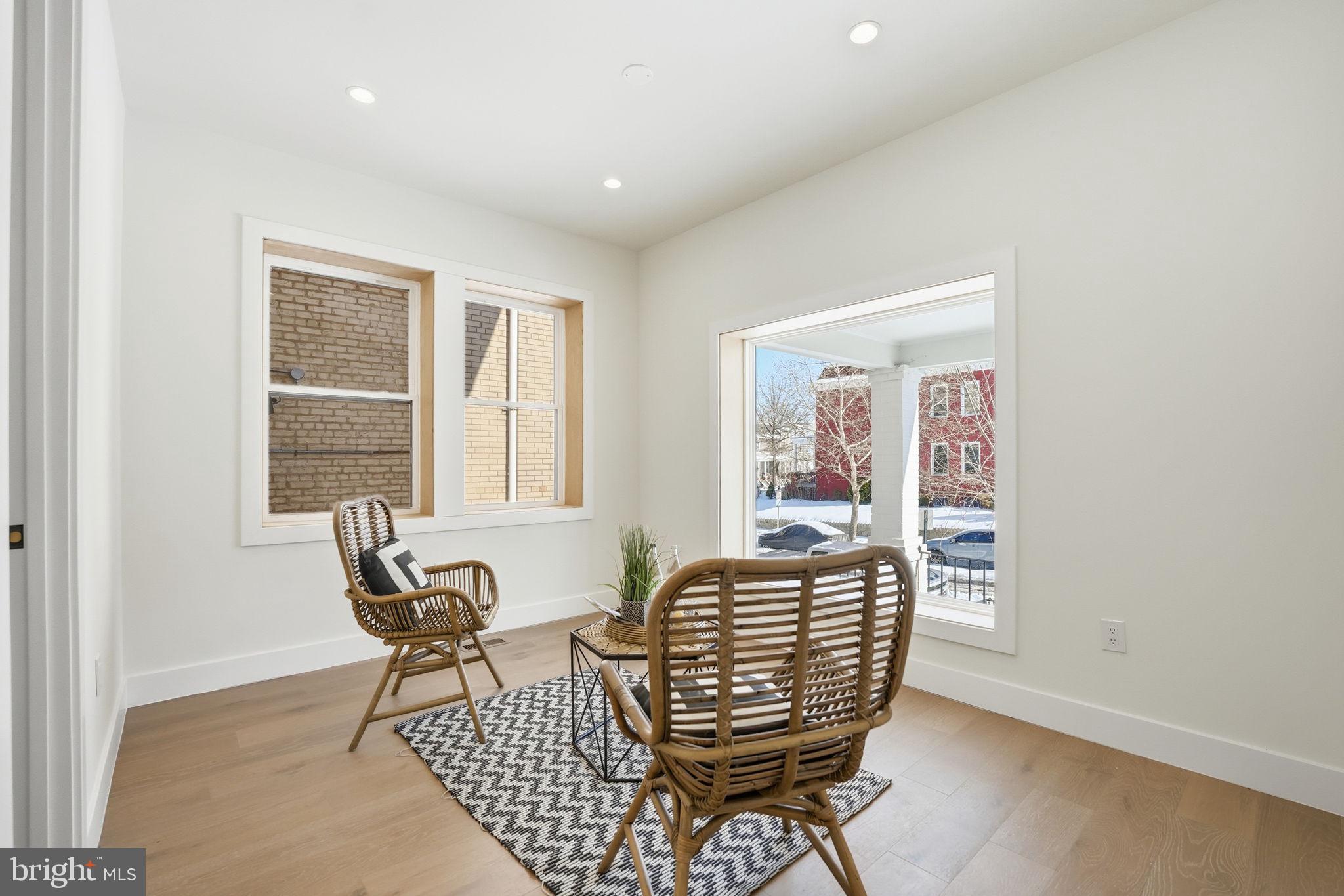 3916 8th Street Northwest, Unit B Washington, DC 20011 - Photo 18 of 24 a living room with furniture a window and outside view