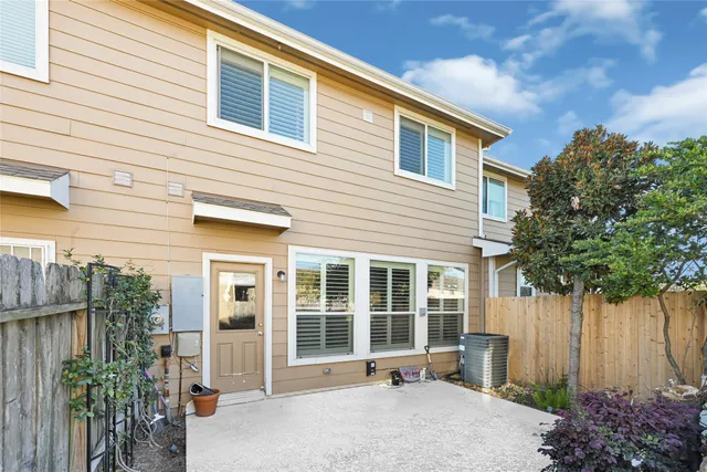 a house view with a garden space