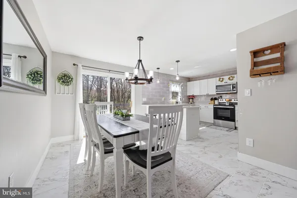 a view of a dining room with furniture