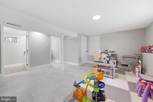 a playing room with toys and toys