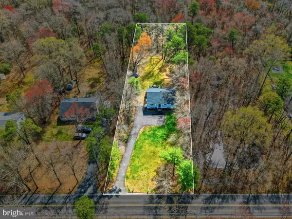 a backyard of a building with trees