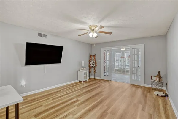 a view of a livingroom with a flat screen tv