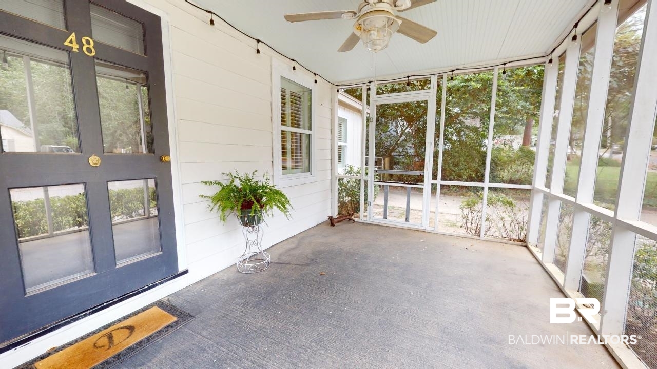 48 Hathaway Road West Mobile, AL 36608 - Photo 2 of 40 Unfurnished sunroom with ceiling fan