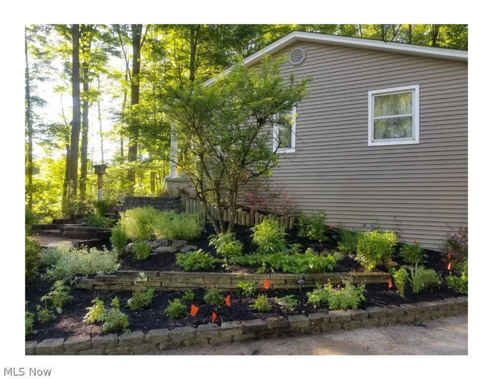 11735 Sperry Road Chesterland, OH 44026 - Photo 2 of 35 View of Side Gardens Walking Up to the Front Door