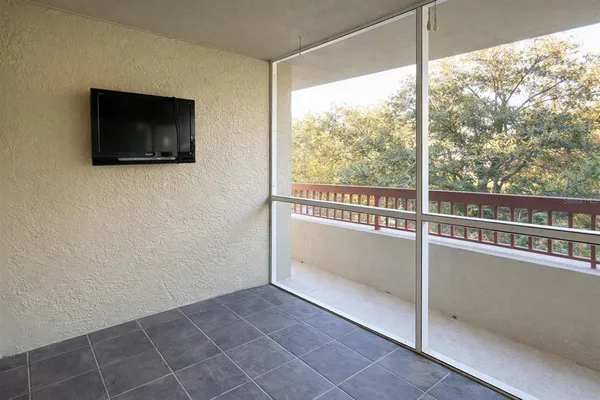 wooden floor and window in an empty room