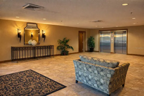 a kitchen with a sink a stove and cabinets
