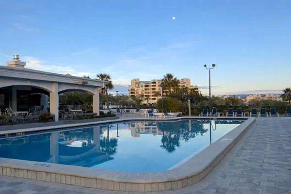 a view of swimming pool with a yard