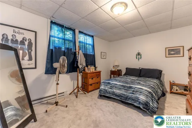 a kitchen with granite countertop a sink stainless steel appliances and cabinets