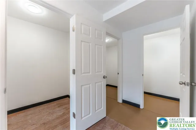 a bathroom with a sink toilet and a mirror