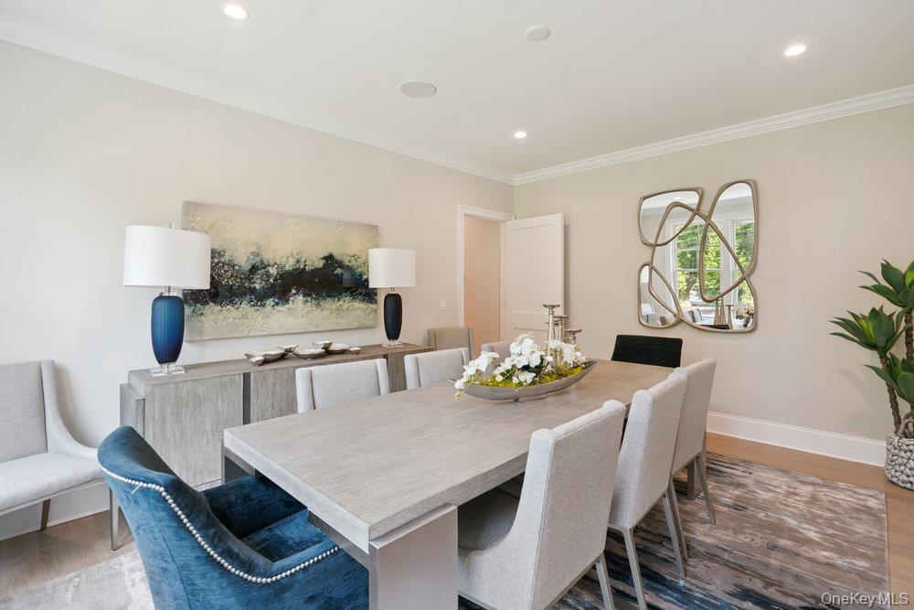 48 Plainview Road Woodbury, NY 11797 - Photo 23 of 49 a view of a dining room with furniture
