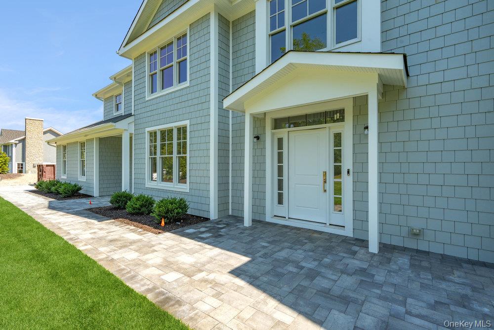 48 Plainview Road Woodbury, NY 11797 - Photo 5 of 49 a view of entrance of the house
