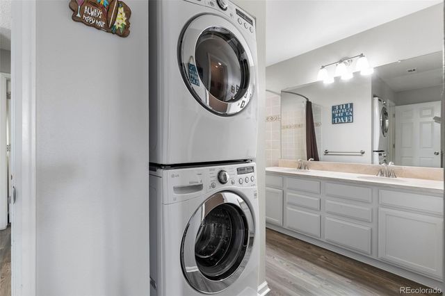 a view of a hallway with washer and dryer