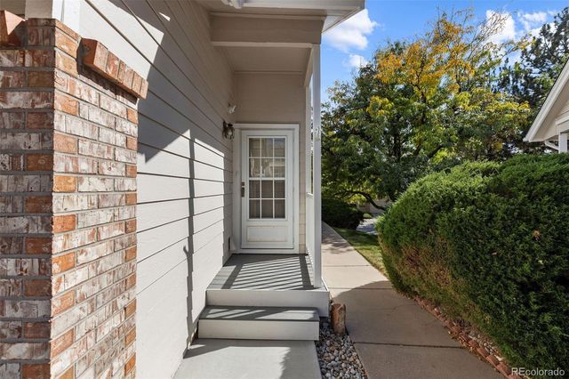 a view of a house with a street