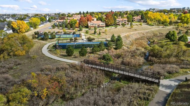 a view of a water pond with a city view
