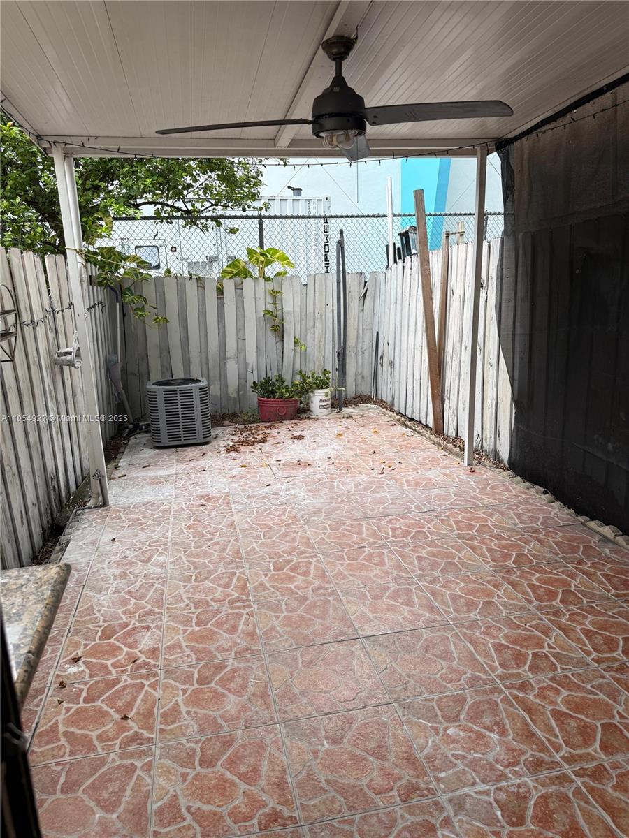 2310 West 60th Street, Unit 9G Hialeah, FL 33016 - Photo 13 of 15 a view of wooden fence