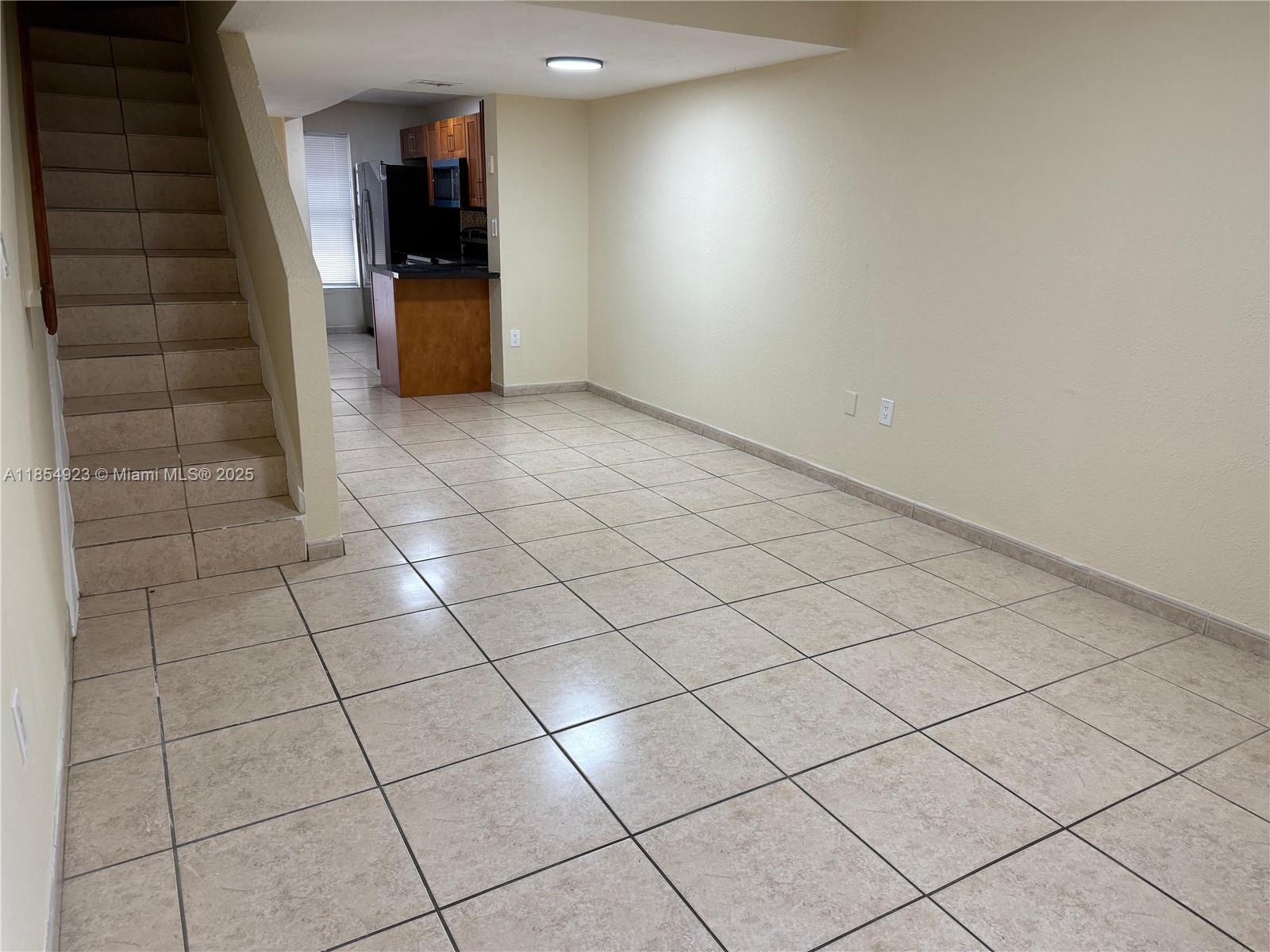 2310 West 60th Street, Unit 9G Hialeah, FL 33016 - Photo 3 of 15 a view of a kitchen