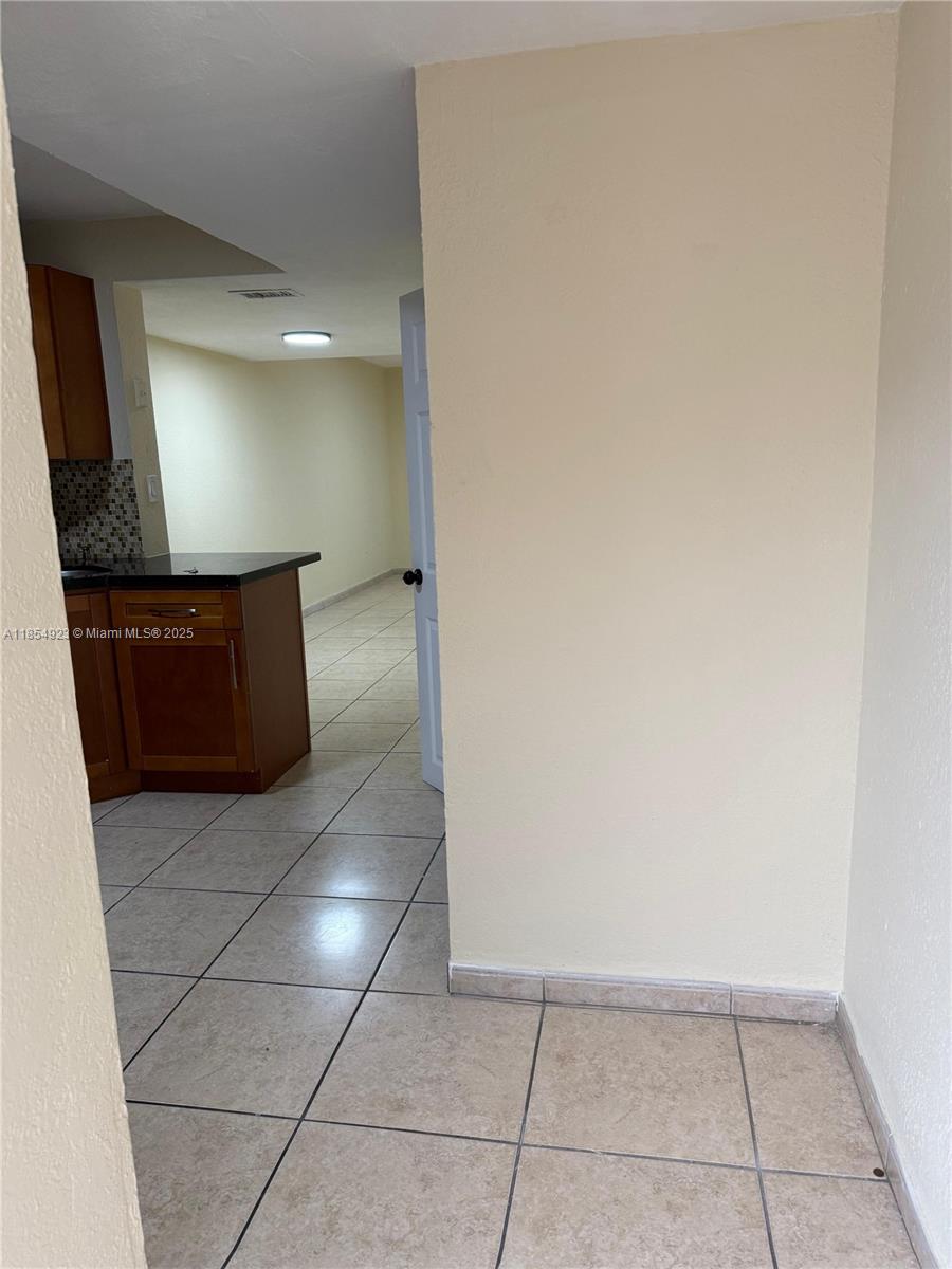 2310 West 60th Street, Unit 9G Hialeah, FL 33016 - Photo 7 of 15 a view of workspace