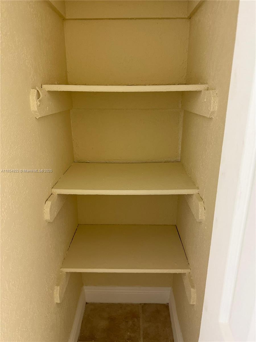 2310 West 60th Street, Unit 9G Hialeah, FL 33016 - Photo 10 of 15 a close view of closet