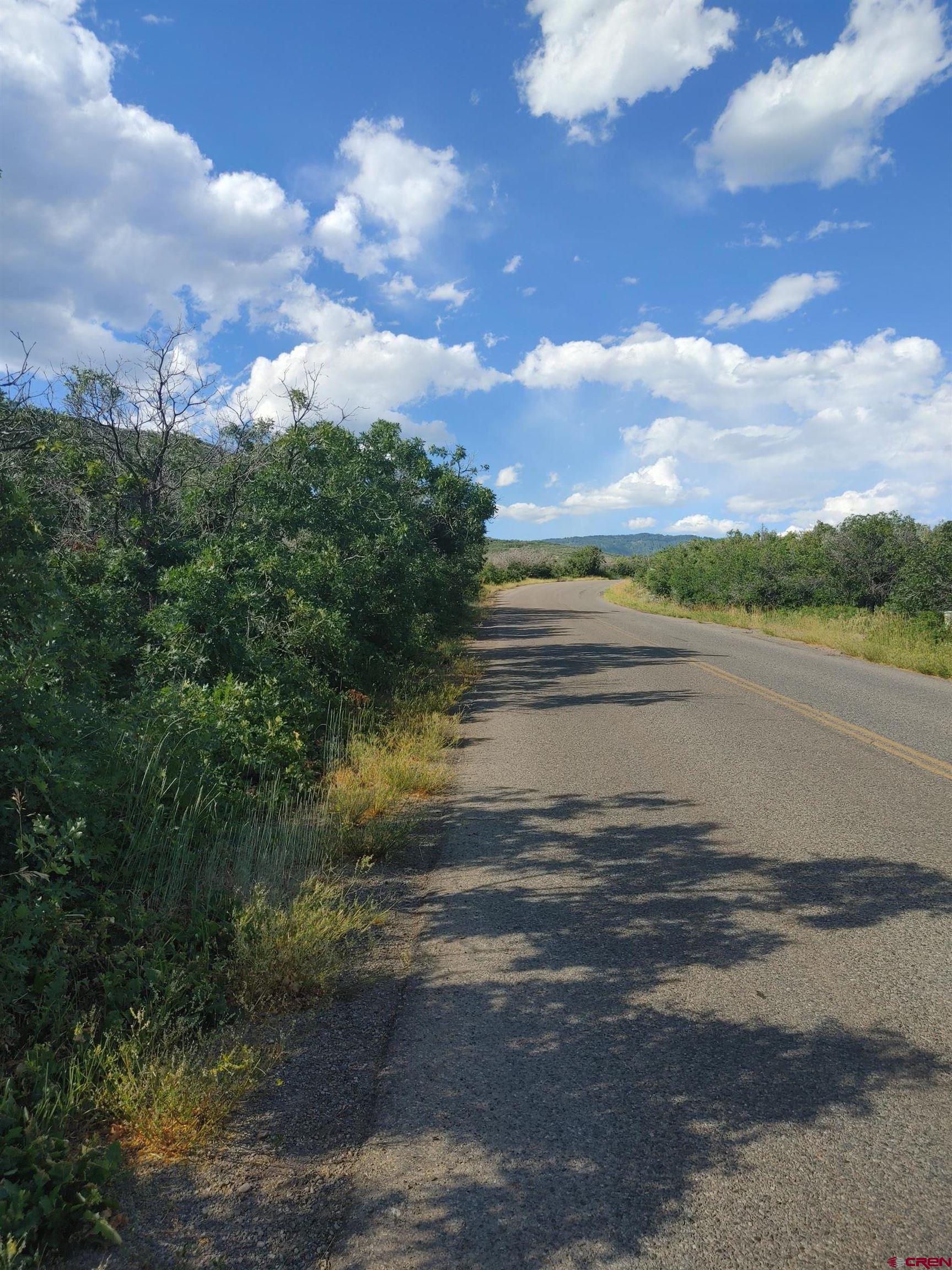 21501 Surface Creek Road Cedaredge, CO 81413 - Photo 1 of 9 a view of an ocean and beach