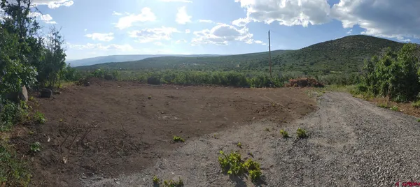 a view of an outdoor space with mountain view
