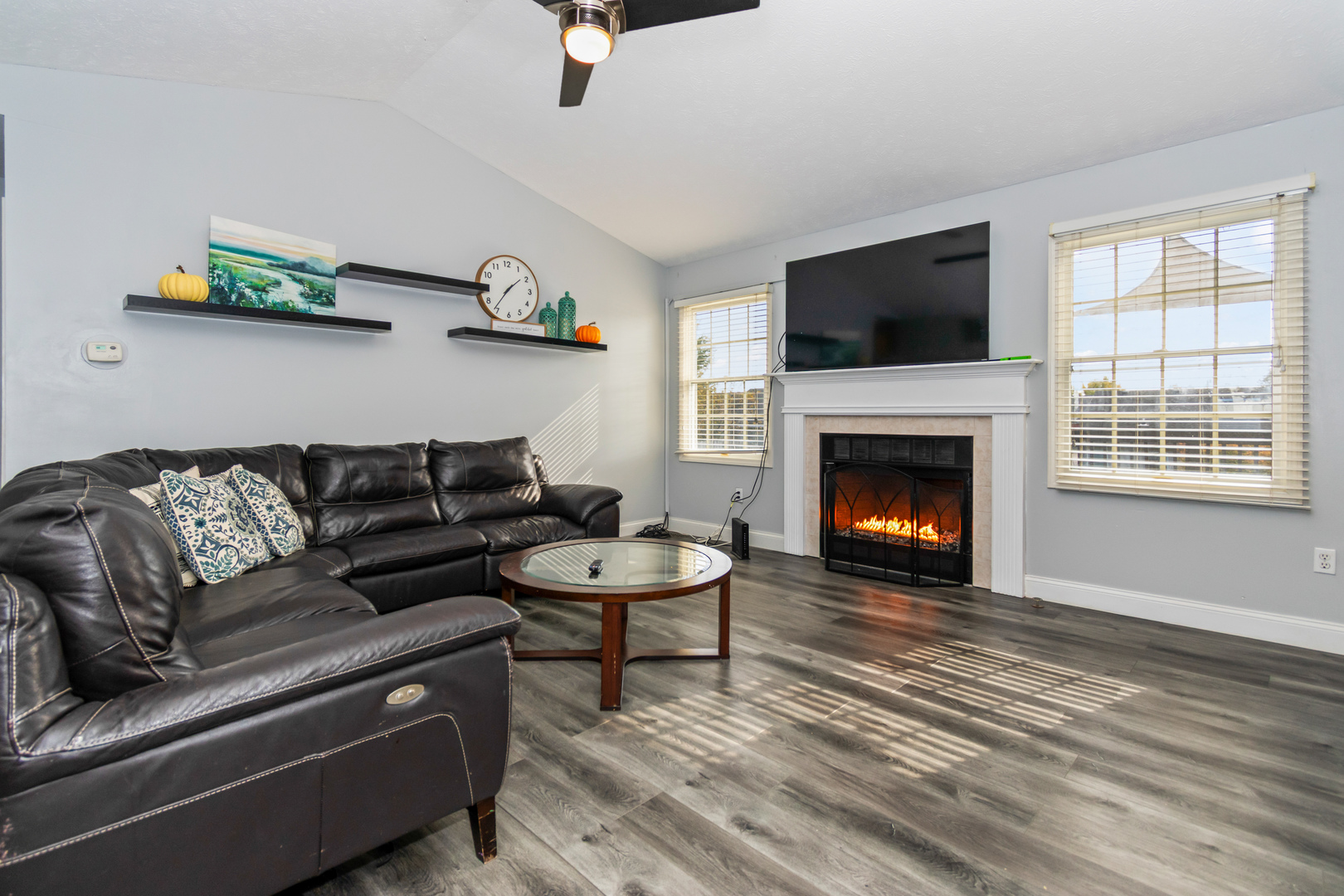 1914 Cobblestone Washington, IL 61571 - Photo 12 of 33 a living room with furniture and a fireplace