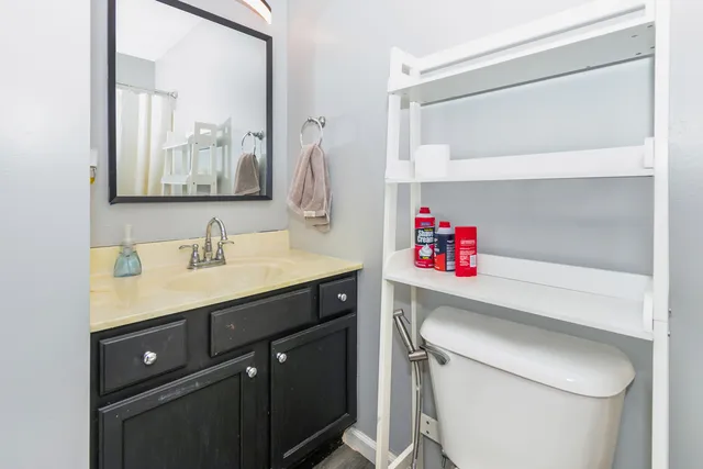 a utility room with a sink dryer and washer