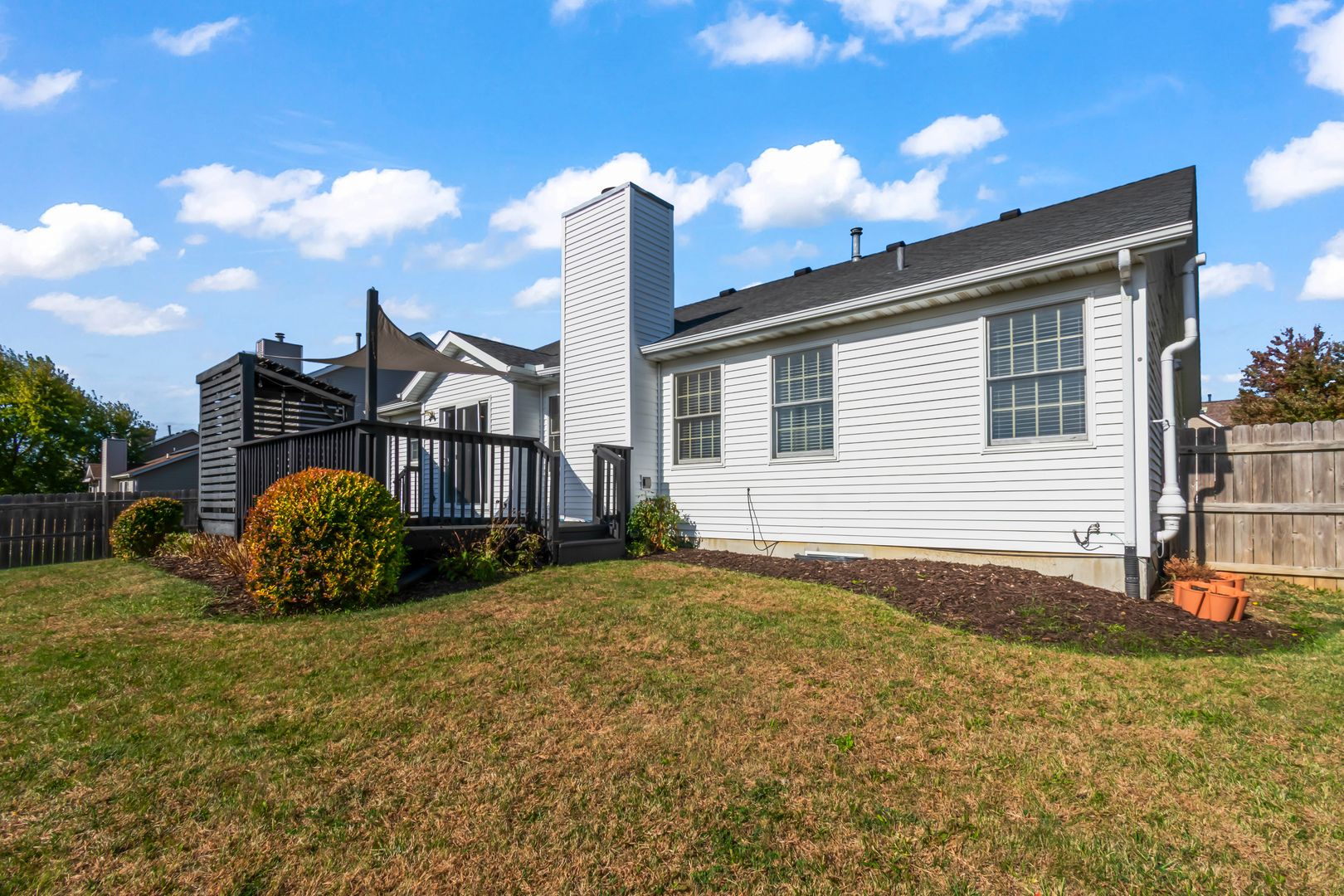 1914 Cobblestone Washington, IL 61571 - Photo 31 of 33 a backyard of a house with barbeque oven and outdoor seating
