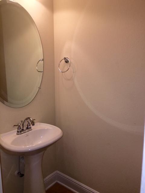 624 Red Fern Road Crestview, FL 32536 - Photo 24 of 26 a bathroom with a sink and mirror