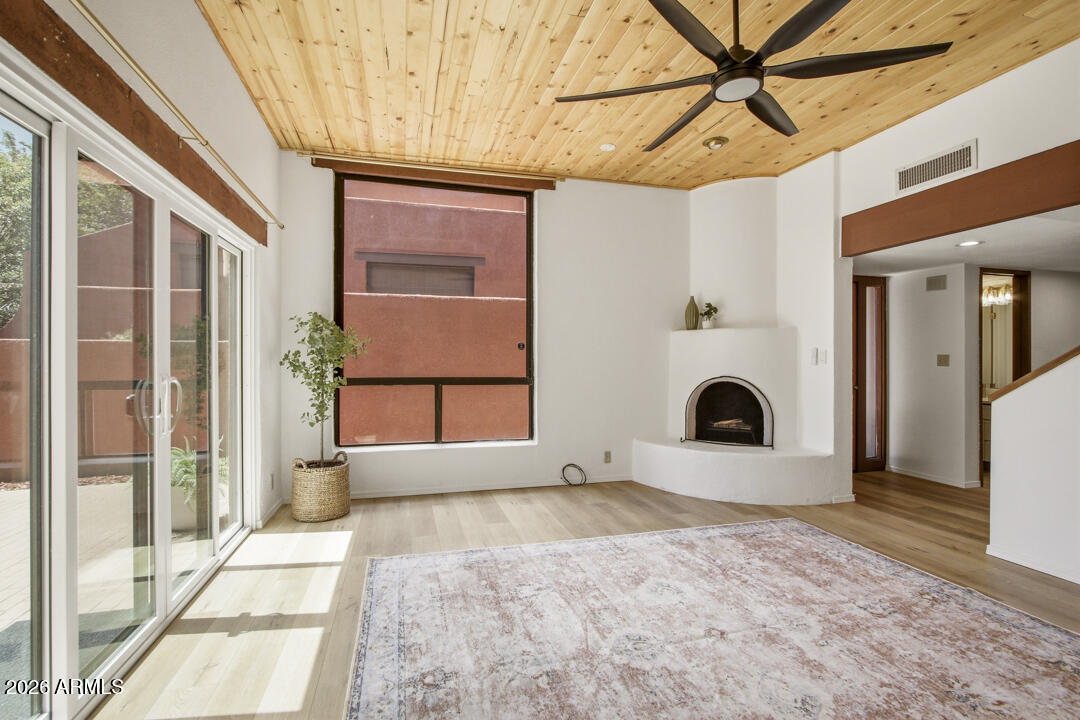 165 Verde Valley School Road, Unit 6 Sedona, AZ 86351 - Photo 11 of 40 a view of a room with a fireplace and a window