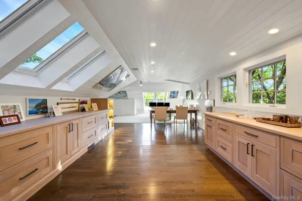 a large kitchen with stainless steel appliances granite countertop lots of counter top space