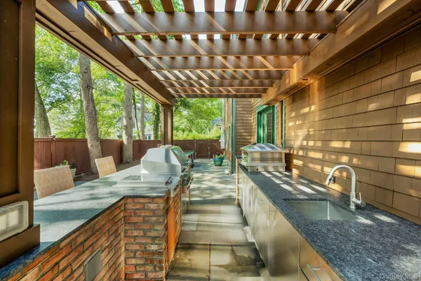 a view of a patio with swimming pool