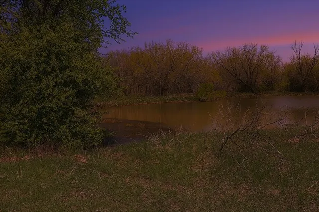 a view of a lake with a mountain