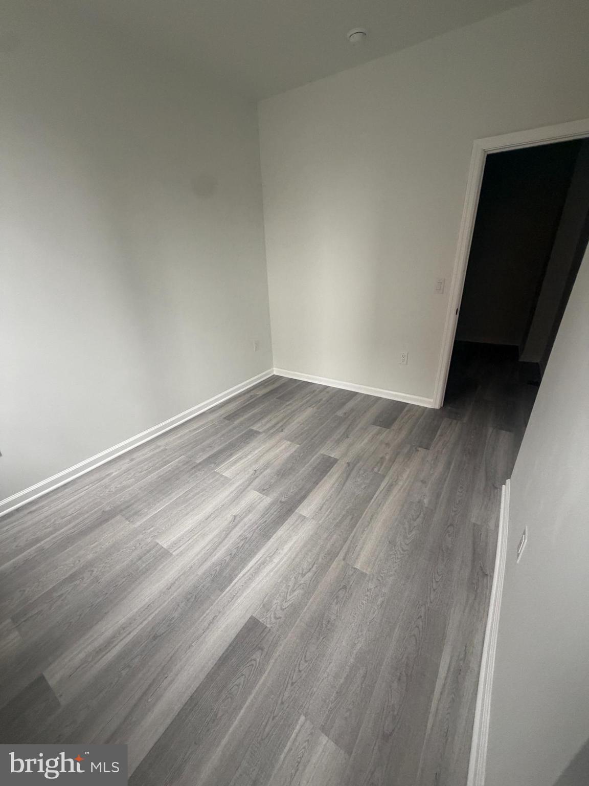112 East Huntingdon Street, Unit 1 Philadelphia, PA 19125 - Photo 3 of 10 a view of empty room with wooden floor