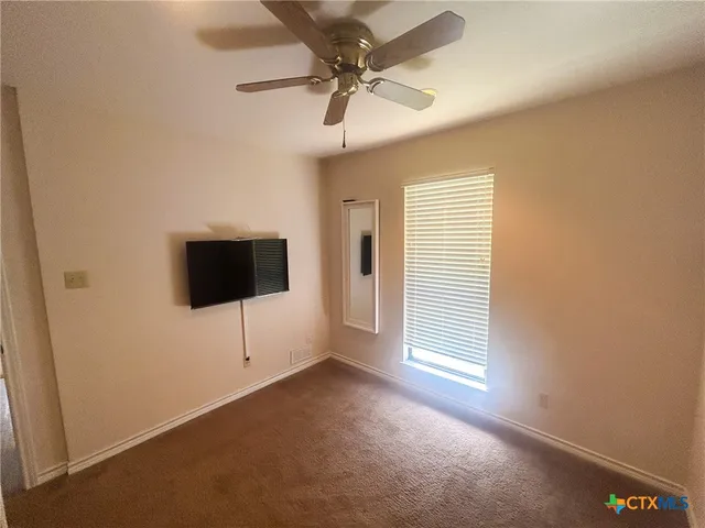 a view of a livingroom with a flat screen tv
