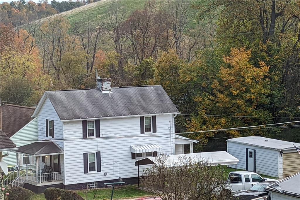 71 Blanche Road Fredericktown, PA 15333 - Photo 1 of 19 a aerial view of a house with a yard and trees