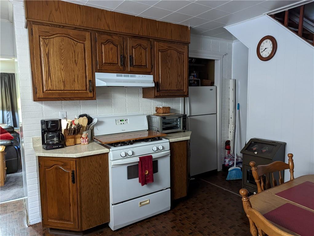 71 Blanche Road Fredericktown, PA 15333 - Photo 11 of 19 a kitchen with stainless steel appliances granite countertop a stove and a refrigerator